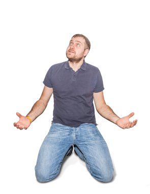 Desperate young man on his knees clipart