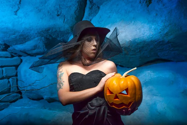 Halloween concept with young witch woman — Stock Photo, Image