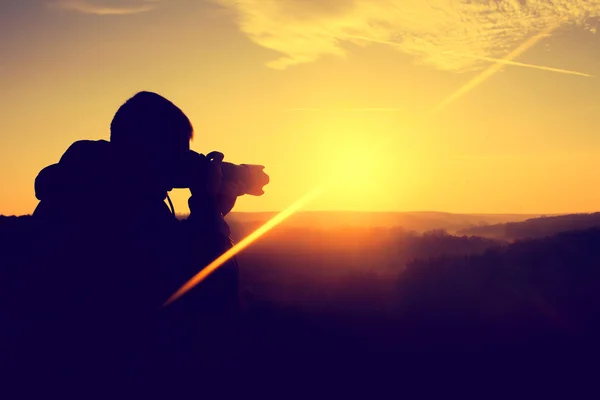 Photographer in the morning at sunrise — Stock Photo, Image