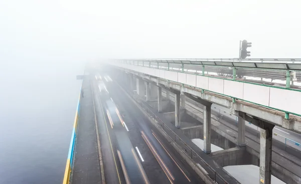 Metro bridge in Kiev in the fog at dawn — Stock Photo, Image