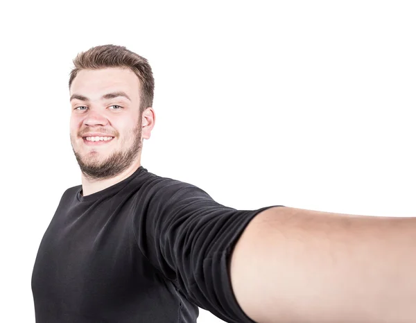 Glücklicher junger Mann, der ein Selfie-Foto macht. isoliert auf weißem Hintergrund — Stockfoto