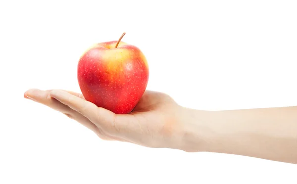 Χέρι κρατώντας το μήλο απομονωμένο σε λευκό φόντο — Φωτογραφία Αρχείου