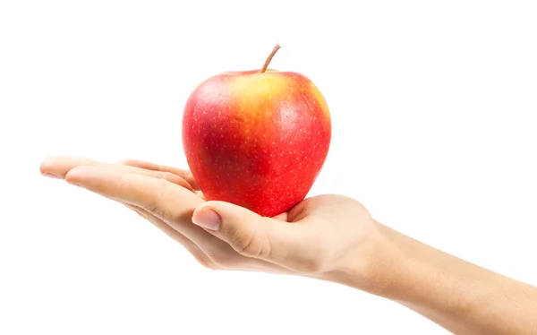 Mano sosteniendo manzana aislada sobre fondo blanco — Foto de Stock