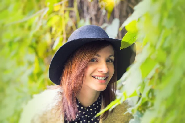 Young fashion woman happy in colorful forest foliage. — Stock Photo, Image