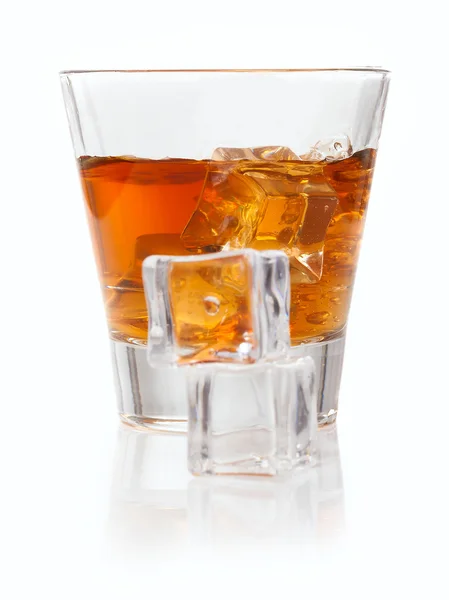 Whiskey splash with ice cubes isolated on white — Stock Photo, Image