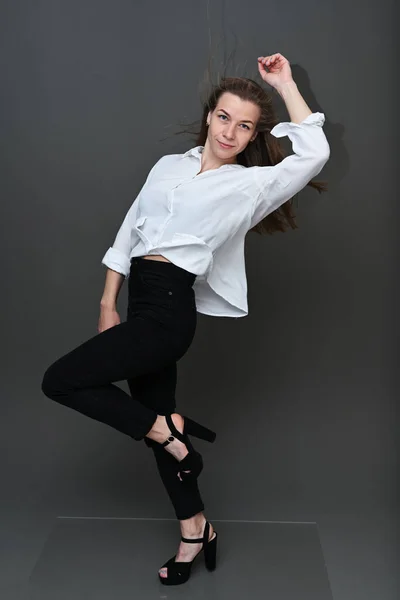 Portrait Caucasian Girl Fluttering Hair Wind Black Trousers White Blouse —  Fotos de Stock