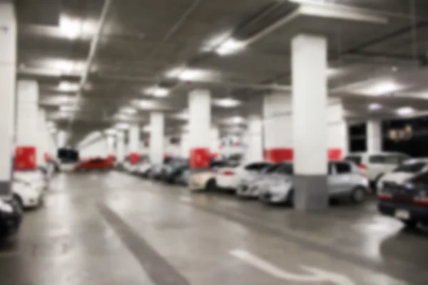 Resumen difuminación aparcamiento coche interior para el fondo — Foto de Stock