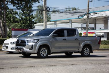 Chiangmai, Thailand -   October 26 2020: Private Pickup Truck Car Toyota Hilux Revo. On road no.1001, 8 km from Chiangmai city.