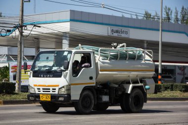 Chiangmai, Thailand -   October 26 2020: Private of Sewage Tank  truck. Photo at road no.121 about 8 km from downtown Chiangmai, thailand.