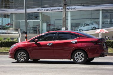 Chiangmai, Thailand -   October 26 2020: Private Eco car, New Nissan Almera. Photo at road no 121 about 8 km from downtown Chiangmai, thailand.