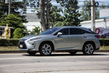 Chiangmai, Thailand -   October 26 2020: Private Suv car Lexus RX.   On road no.1001, 8 km from Chiangmai city.