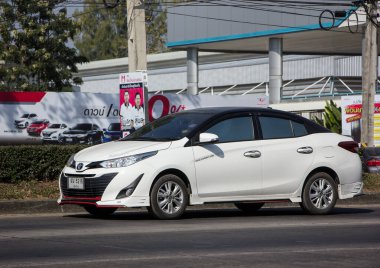 Chiangmai, Thailand - December 17 2020: New Private Sedan car toyota Yaris ATIV Eco Car.  Photo at road no 121 about 8 km from downtown Chiangmai thailand.