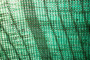 Güneş ışığını azaltmak için Yeşil Güneş Gölgesi Ağı 'nı kapatın