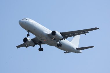 White Airplane landing