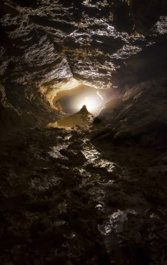 light in a dark cave clipart