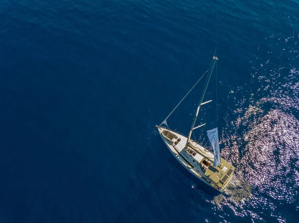 Aerial view of a sailing yacht near the Greek islands