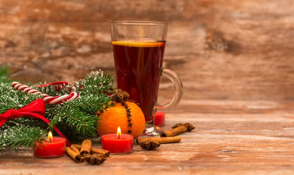 Christmas tree, mandarine, glogg and candles — Stock Photo, Image