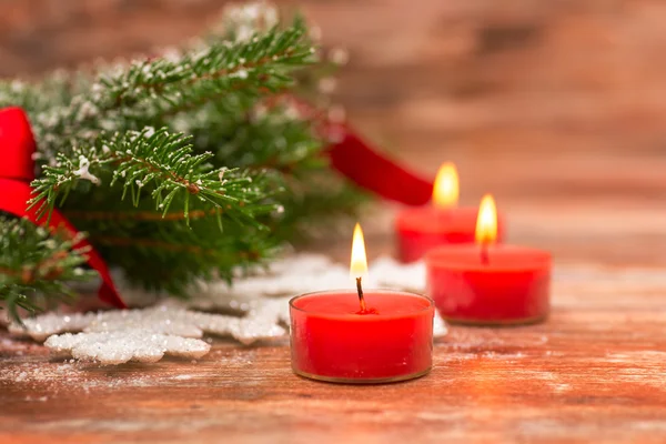 Christmas fir tree with decoration on a wooden — Stock Photo, Image