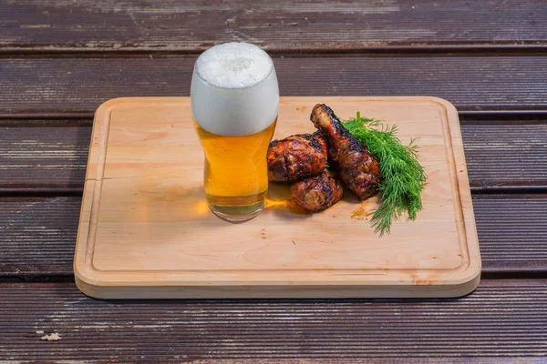Roasted chicken with beer and green — Stock Photo, Image