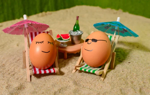 Easter funny eggs under umbrella — Stock Photo, Image