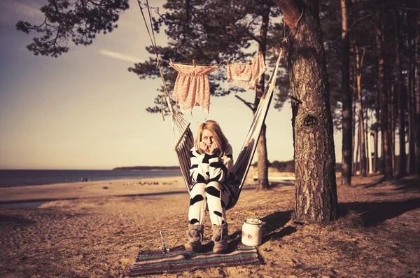 Woman in cow costume relaxing — Stock Photo, Image