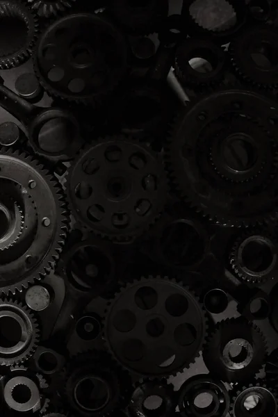 Bir araba motorunun metal dişli tekerlekleri ile endüstriyel arka plan