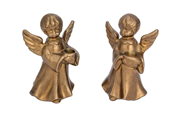 Castiçais de bronze na forma de anjos segurando uma vela — Fotografia de Stock