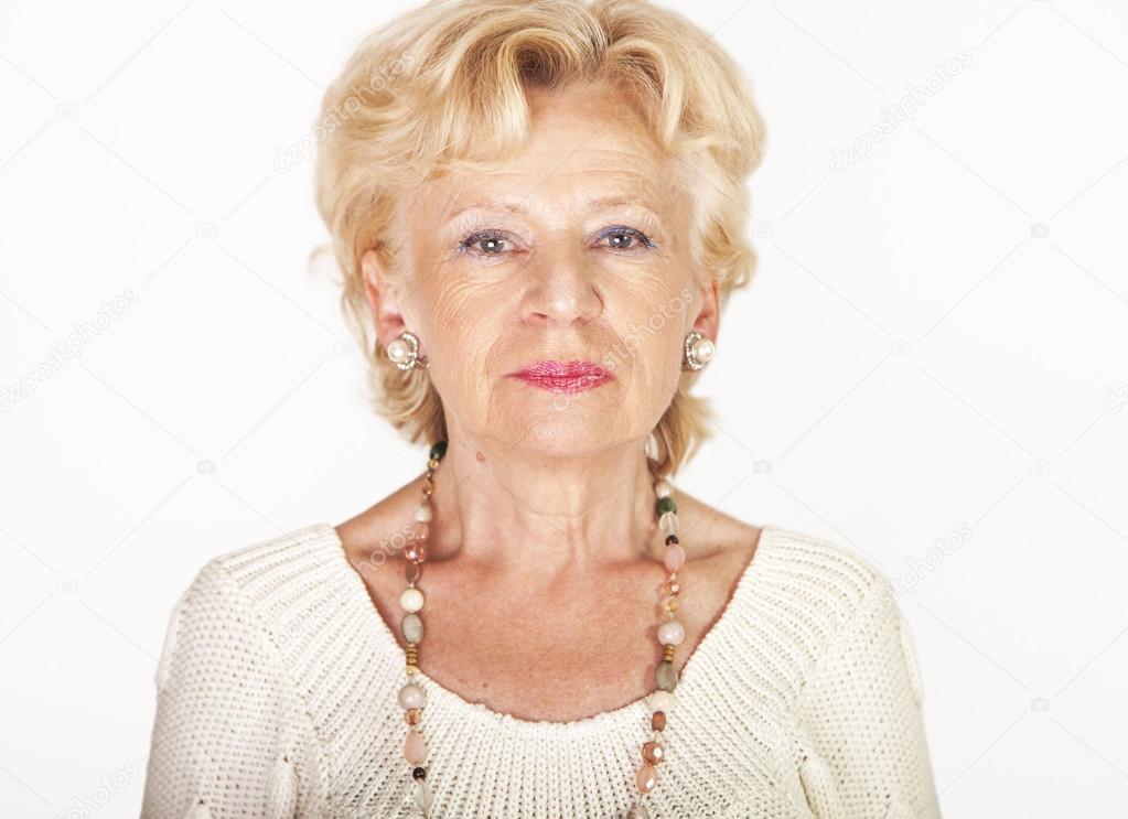 Studio portrait of senior woman