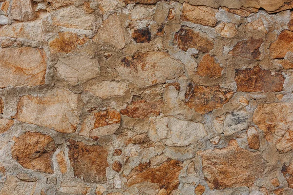 Stenväggskonsistens. Stenvägg som bakgrund eller struktur Stockfoto