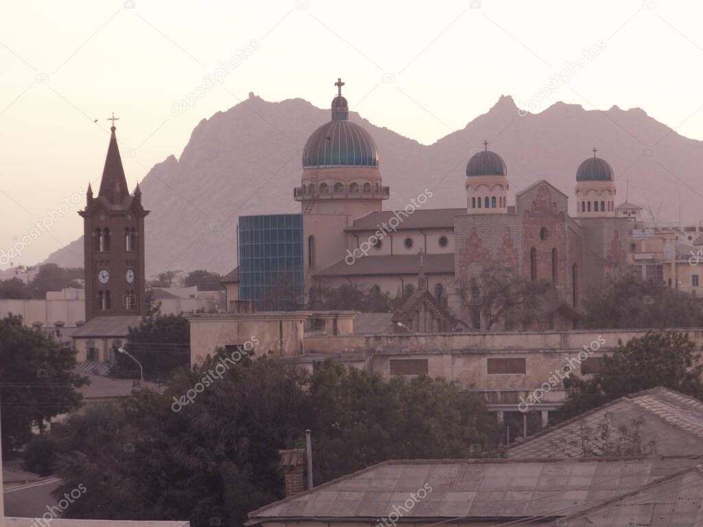 Asmara, Eritrea - January 15, 2021: Travelling around the vilages near Asmara and Massawa. An amazing caption of the trees, mountains and some old typical houses with very hot climate in Eritrea. 