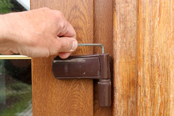 Adjusting Door Hinge Hex Wrench Man Adjusts Doors — Stock Photo, Image