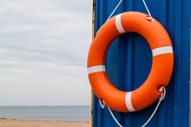 Orange Lifebuoy background Sea