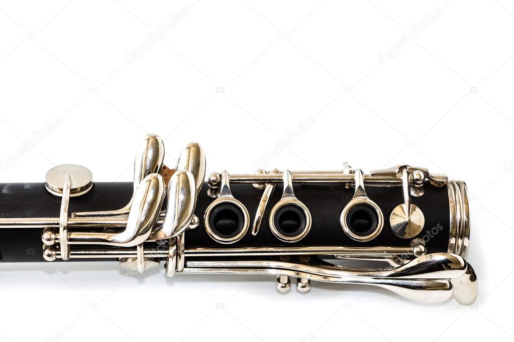close up detail of clarinet on white background