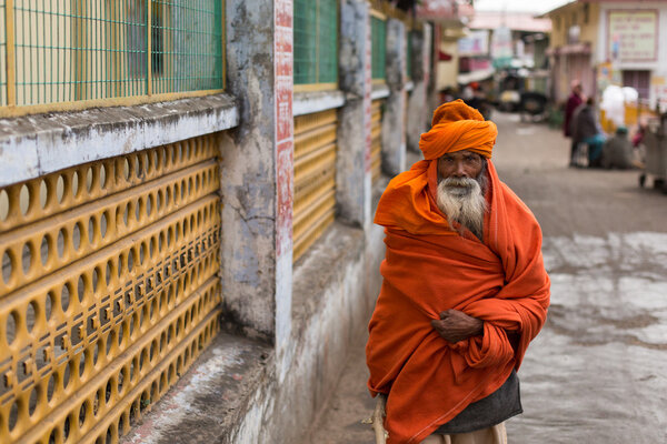 RISHIKESH, INDIA - JAN 02: An unidentified sadhu baba walking on