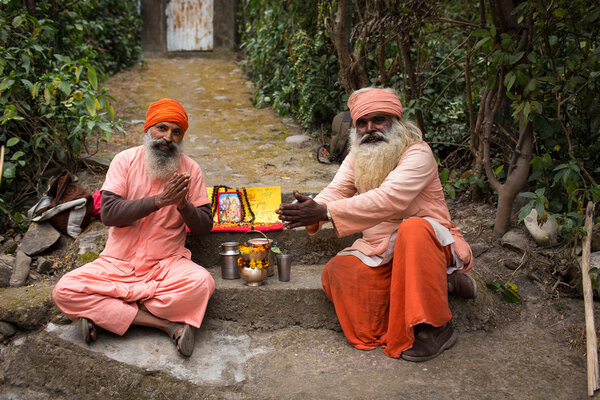 RISHIKESH, INDIA - JAN 03: Unidentified sadhu baba praying for t