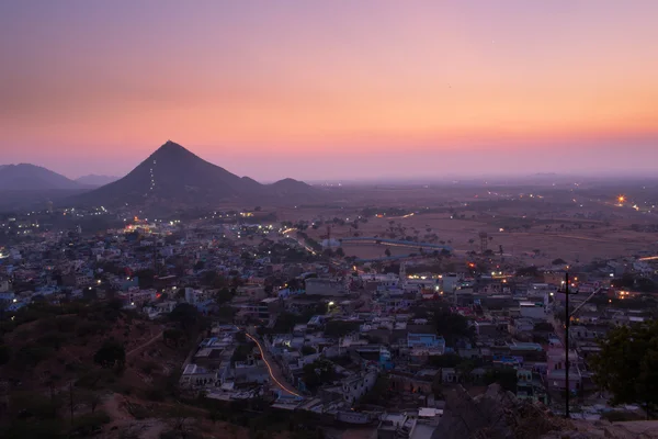 Solnedgang i Pushkar City, Indien - Stock-foto