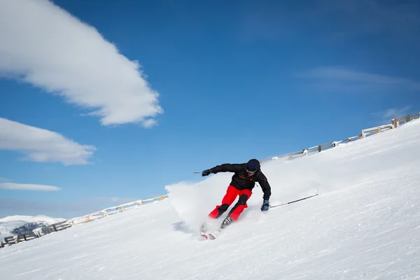 Man sliding on ski — Stock Photo, Image