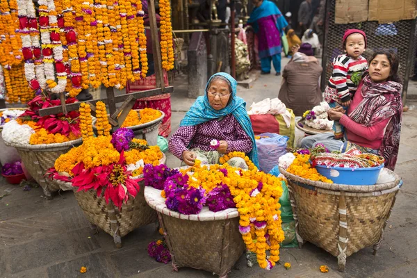 Durbar Square, Nepal, Kathmandu, Nepal - 28 November 2014: Vrouw selli — Stockfoto