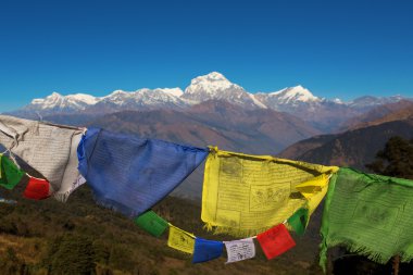 Buddhist prayer flags and The Himalayas clipart