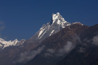 Machhapuchchhre mountain - Fish Tail in English is a mountain in the Annapurna Himalya, Nepal clipart