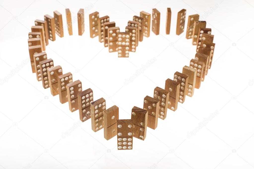 Dominoes standing in heart shape