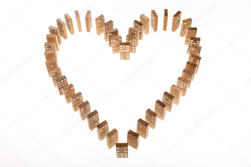 Dominoes standing in heart shape