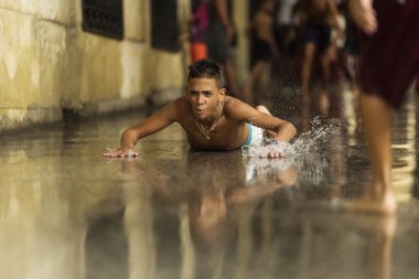 HAVANA, CUBA-OCTOBER 15:Children playing on streets of Havana on