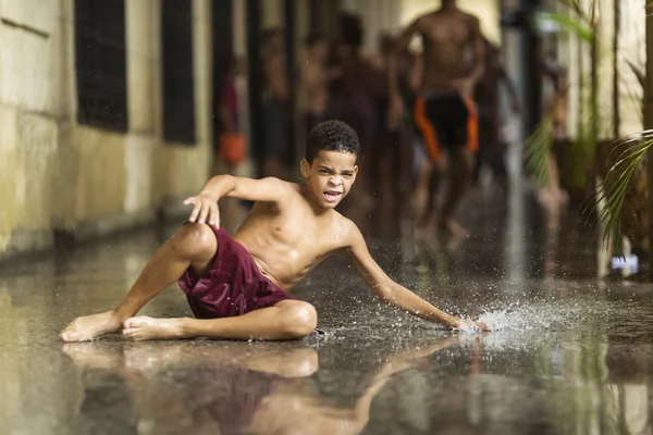 HAVANA, CUBA-OCTOBER 15: Children playing on streets of Havana on — стоковое фото