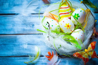 Handcrafted Easter eggs in the nest