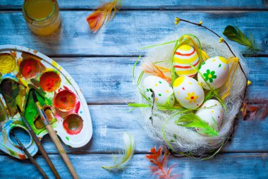 Handcrafted Easter eggs in the nest