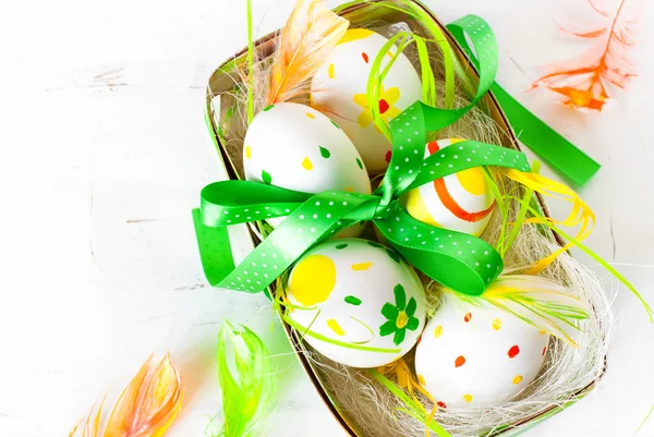 Handcrafted Easter eggs in the nest — Stock Photo, Image