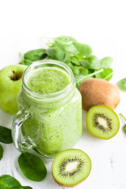 Sağlıklı yeşil güler yüzlü kavanoz.