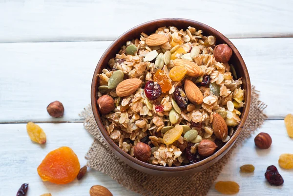 Granola in a wooden bowl. — Stock Photo, Image