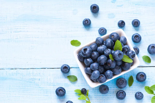 Fresh blueberriaes in white plate — Stock Photo, Image